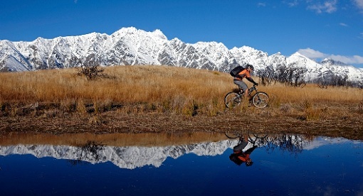 'A day to reflect', featuring a cyclist next to one of the glacier-carved lakes around Queenstown and Wanaka is one of the top five most downloaded images in 2011/2012.